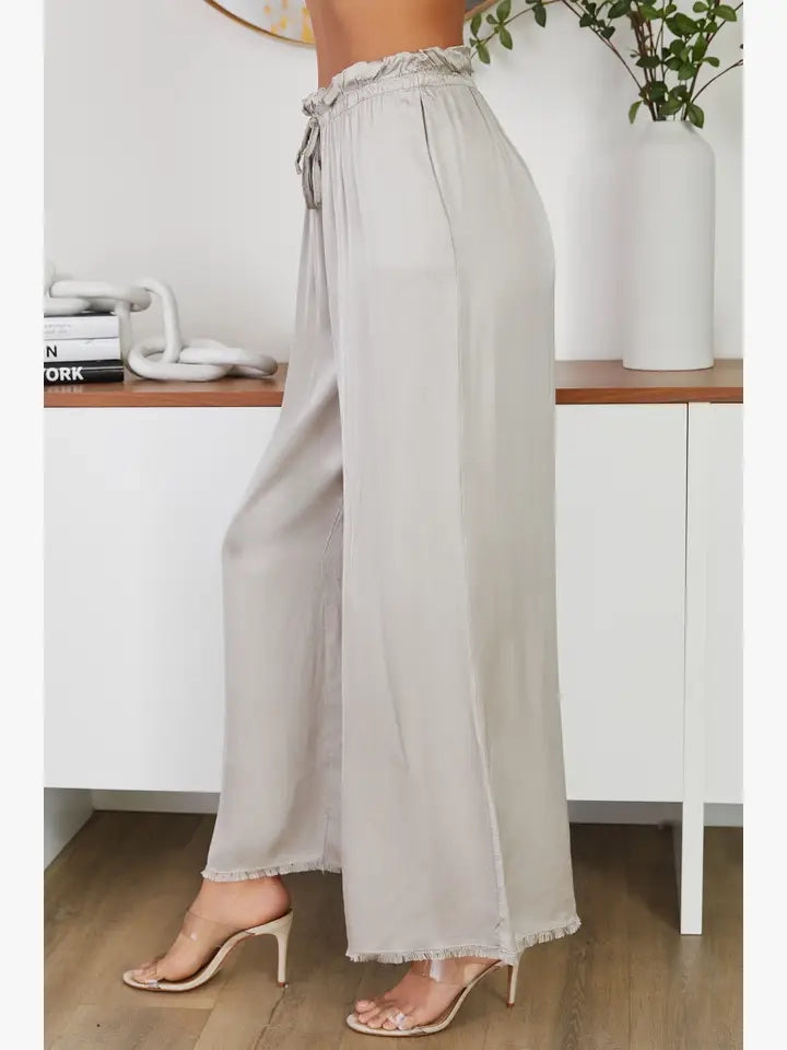 VISCOSE DRAWSTRING WAIST DISTRESSED HEM PALAZZO PANT-BEIGE