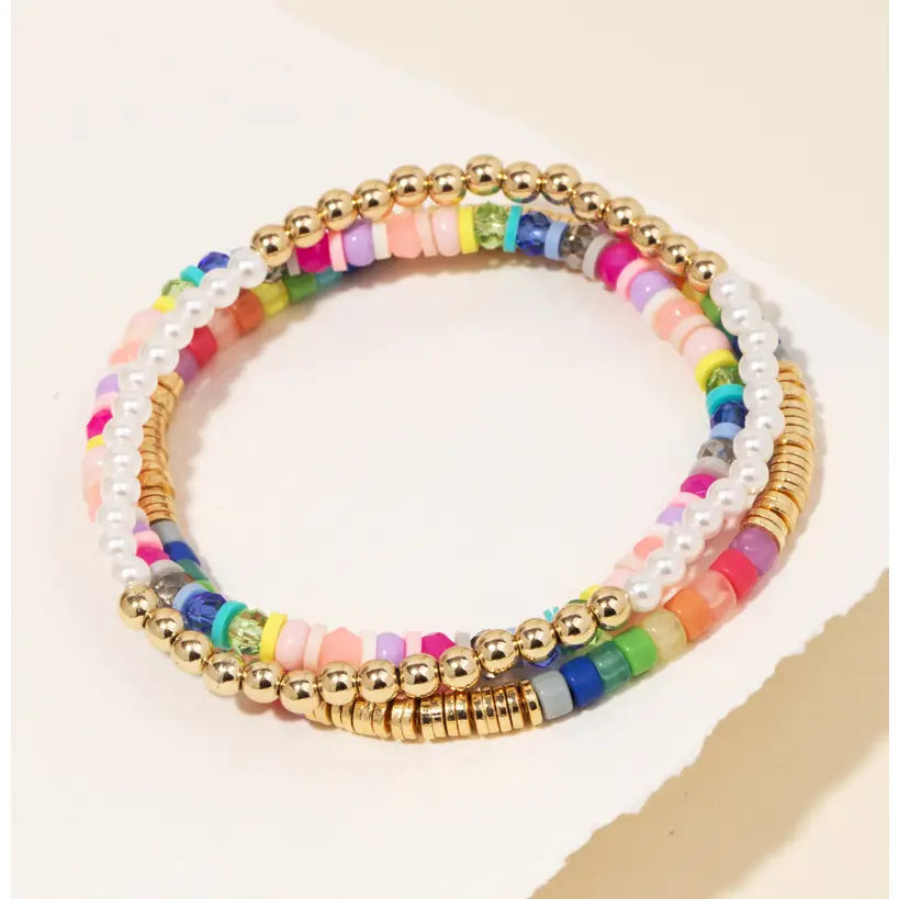 Multicolored beaded bracelet with gold bead accents