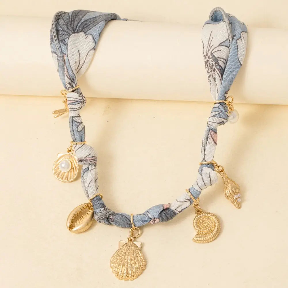 SEA LIFE CHARMS BANDANA NECKLACE-LT. BLUE