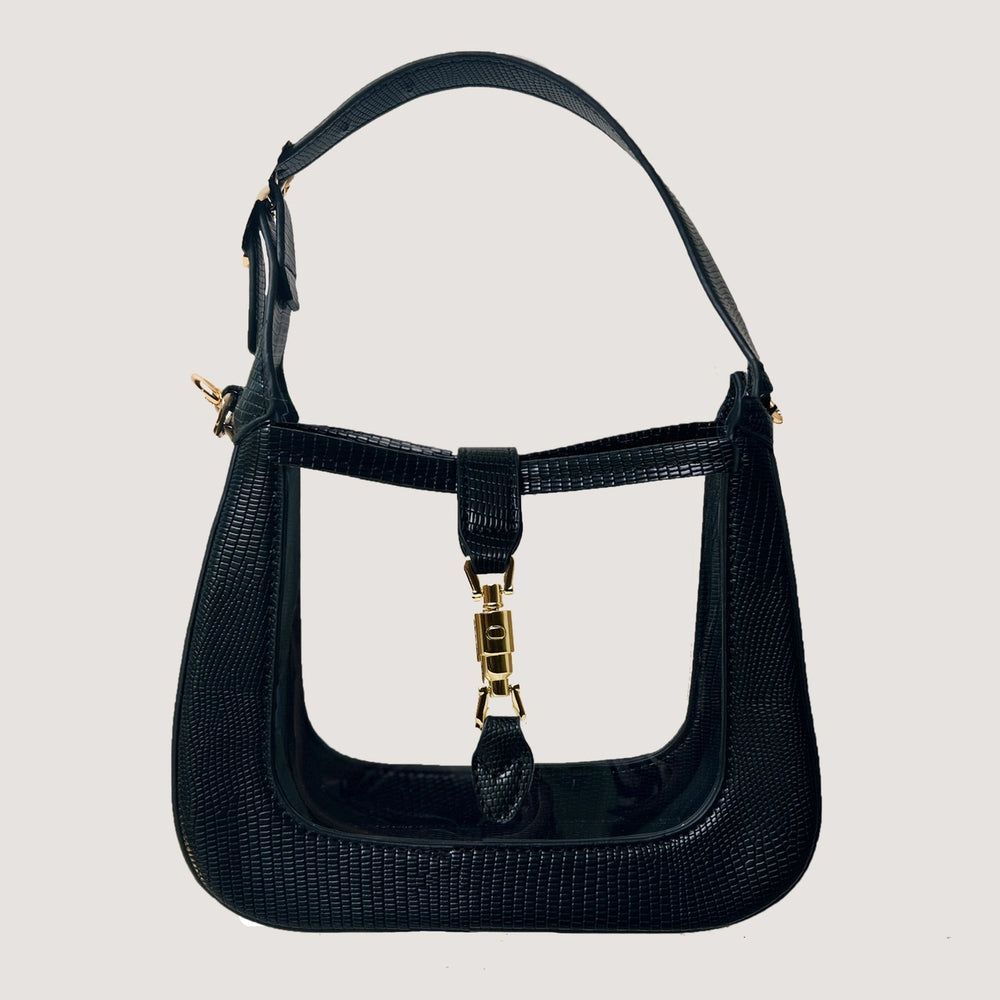 black pebbled faux leather handbag with a transparent middle and adjustable top handle. gold clasp detail at front
