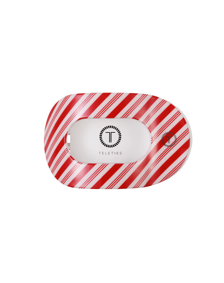 red and white flat round open hair claw