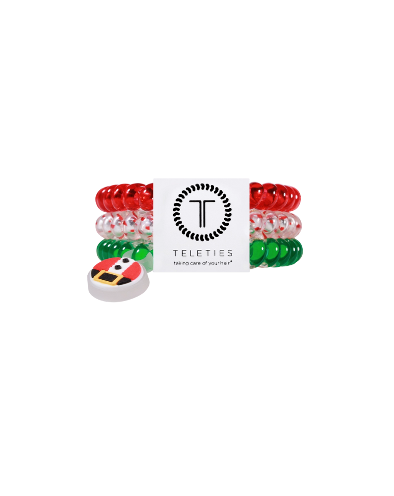 set of three red green and white holiday spiral hair coils with santa charm