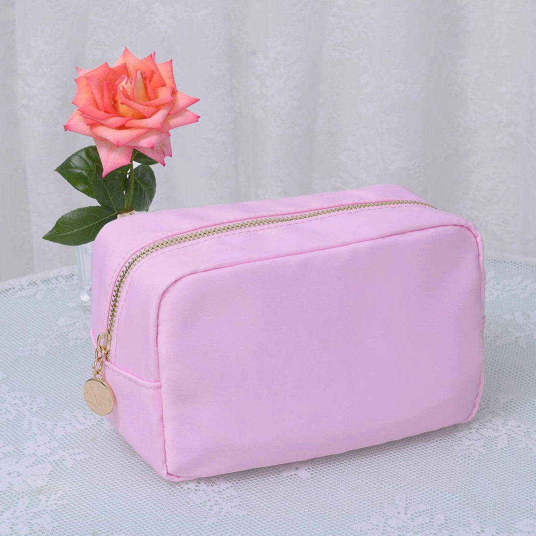 EMMA ROUND ZIPPERED NYLON POUCH-FLAMINGO