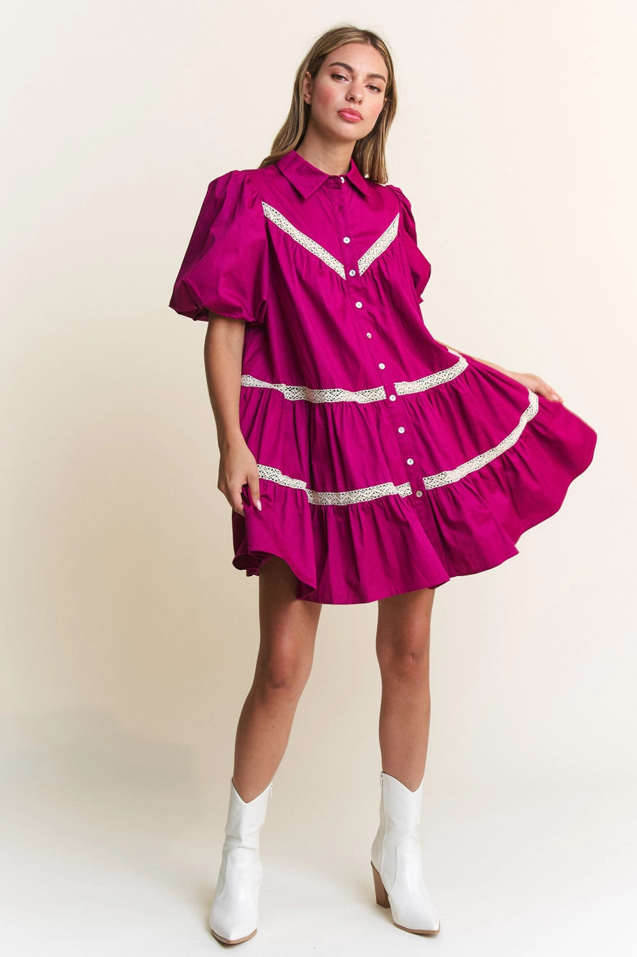magenta button up front mini dress with short puff sleeves and cream lace trim detail throughout