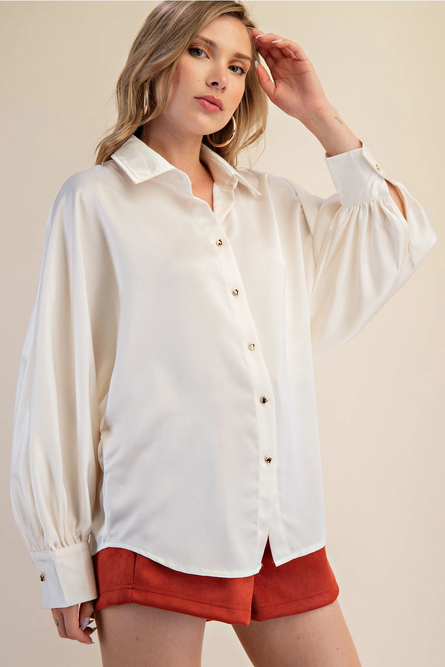 ivory satin button up long sleeve blouse with classic collar and voluminous sleeves