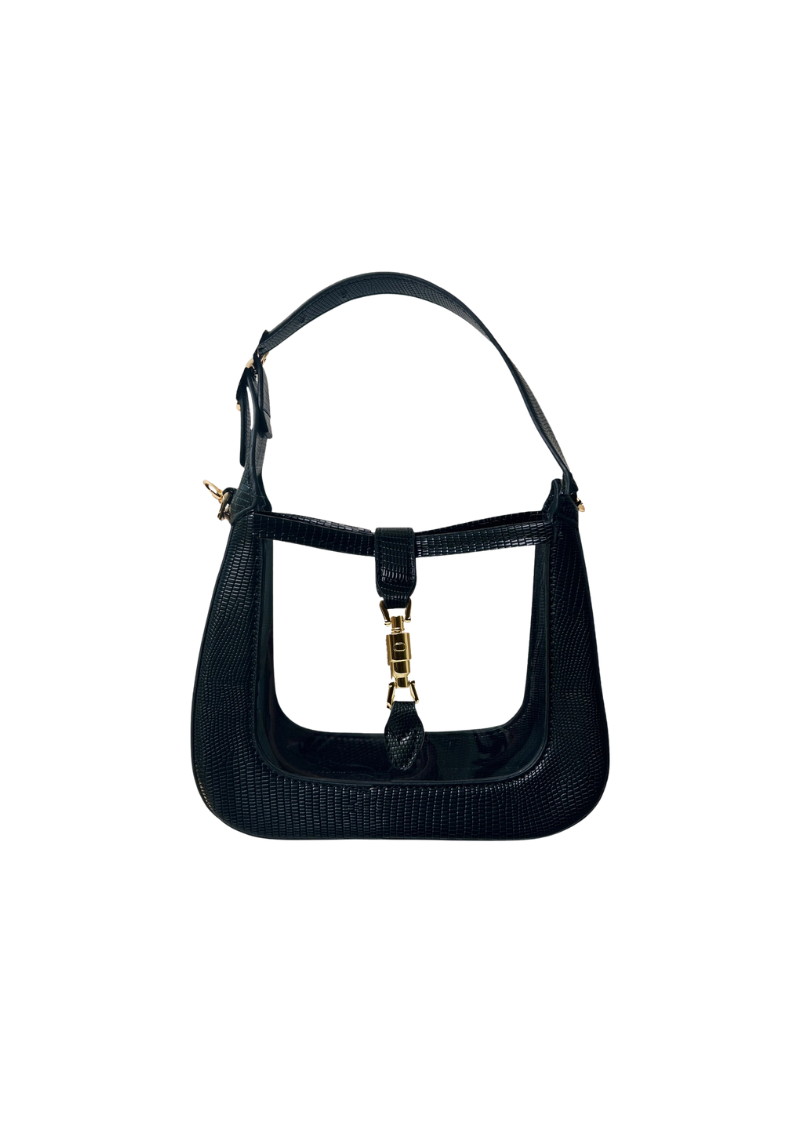 black pebbled faux leather handbag with a transparent middle and adjustable top handle. gold clasp detail at front