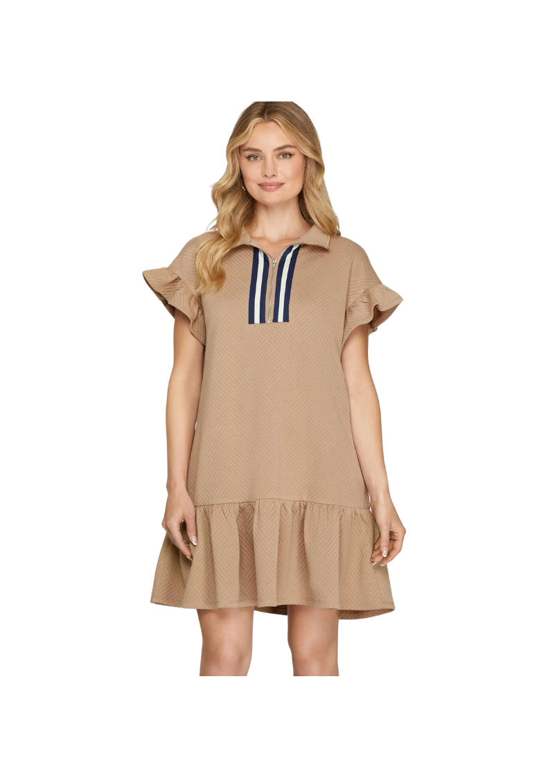 tan mini dress with ruffled hem and short ruffled sleeves. 3/4" zip and collar