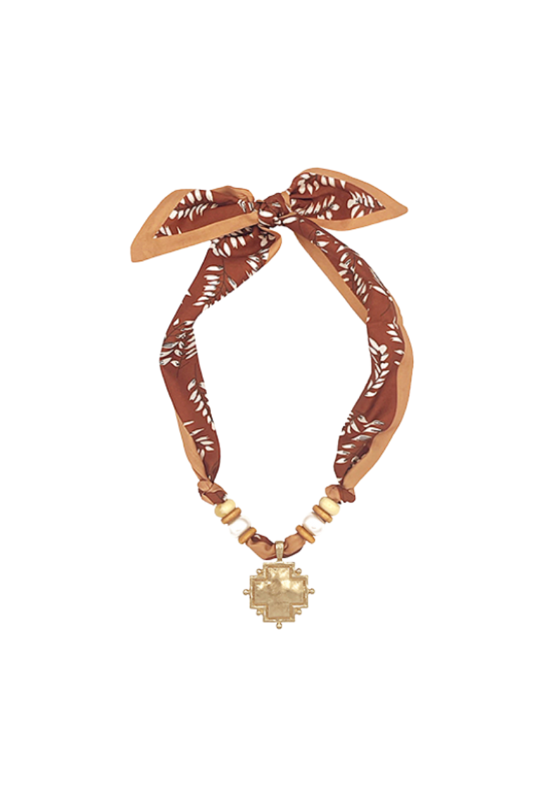 brown scarf necklace with beads and gold cross burst pendant